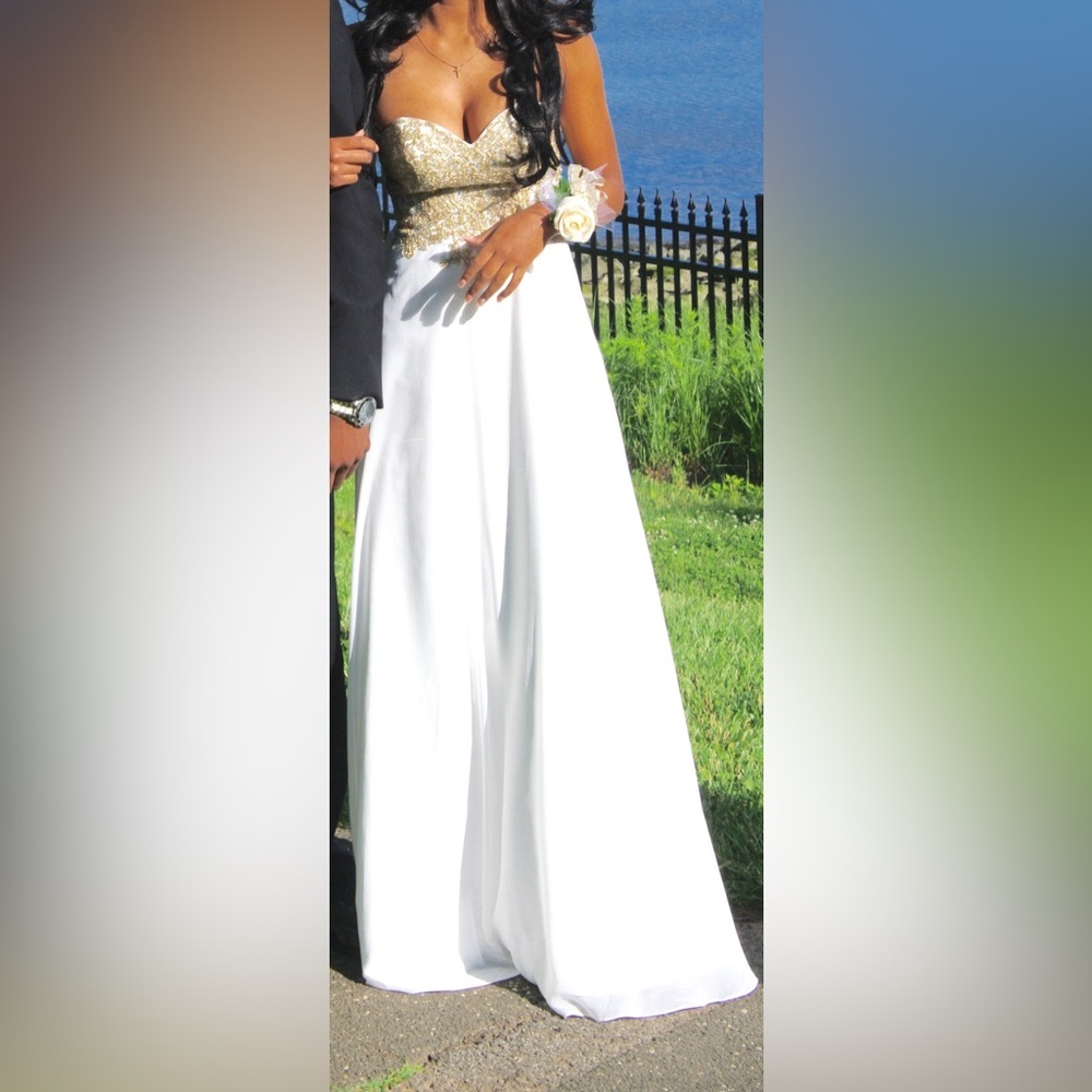elegant detail prom dress with corset back. Comes with original garment bag.